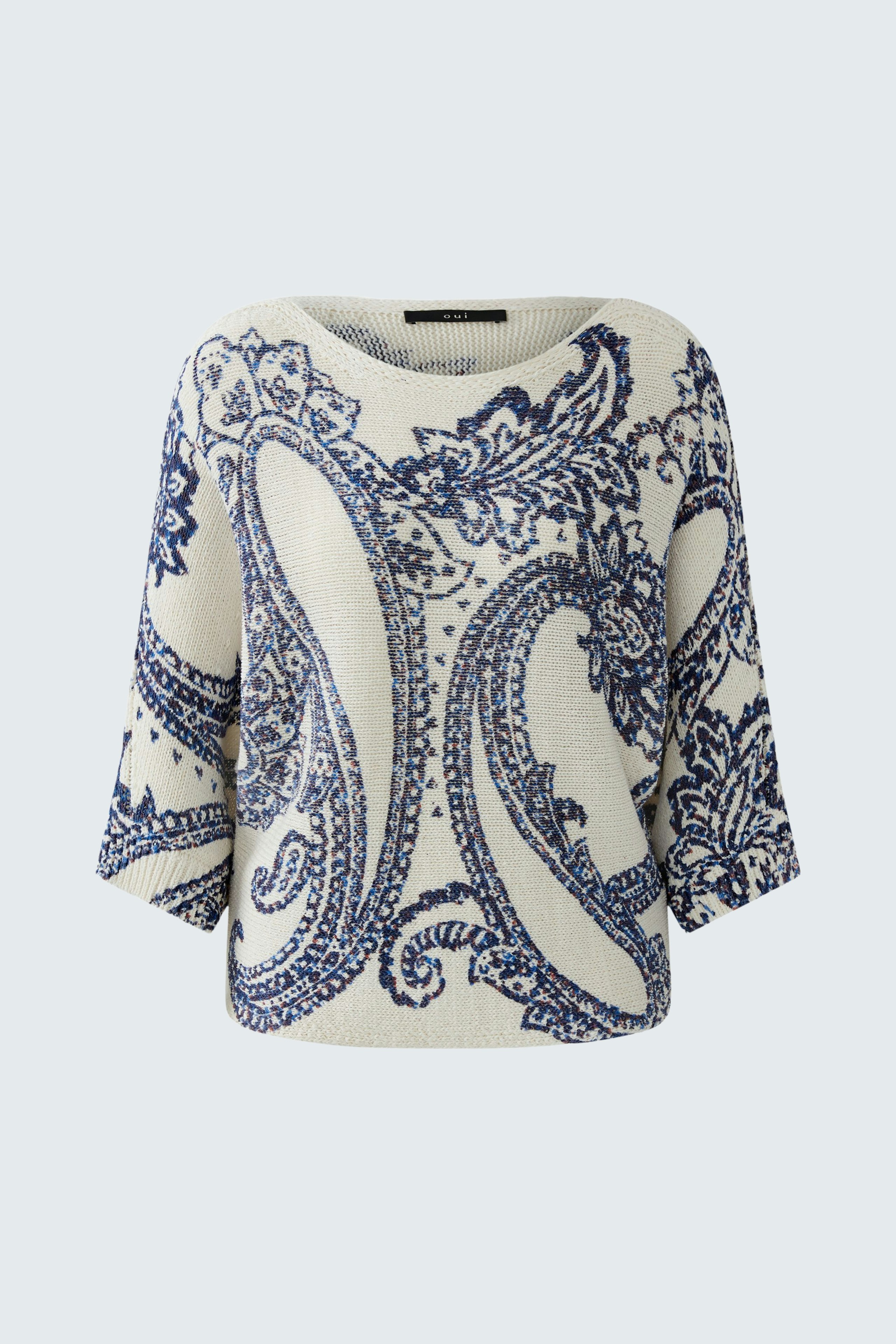 Casual women's pullover in cream with blue paisley pattern, featuring a relaxed fit and three-quarter sleeves.