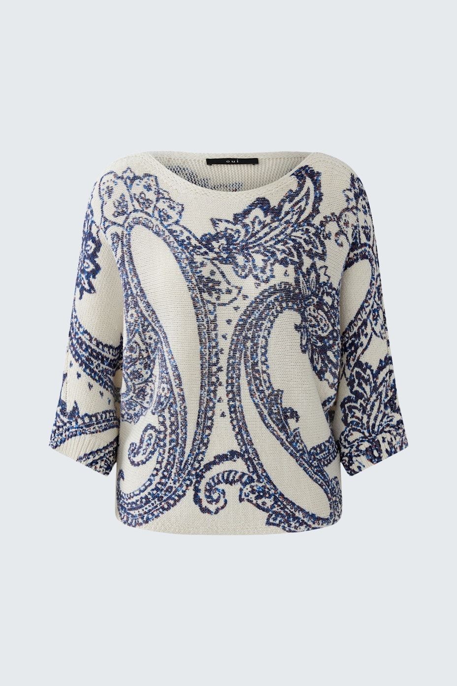 Casual women's pullover in cream with blue paisley pattern, featuring a relaxed fit and three-quarter sleeves.