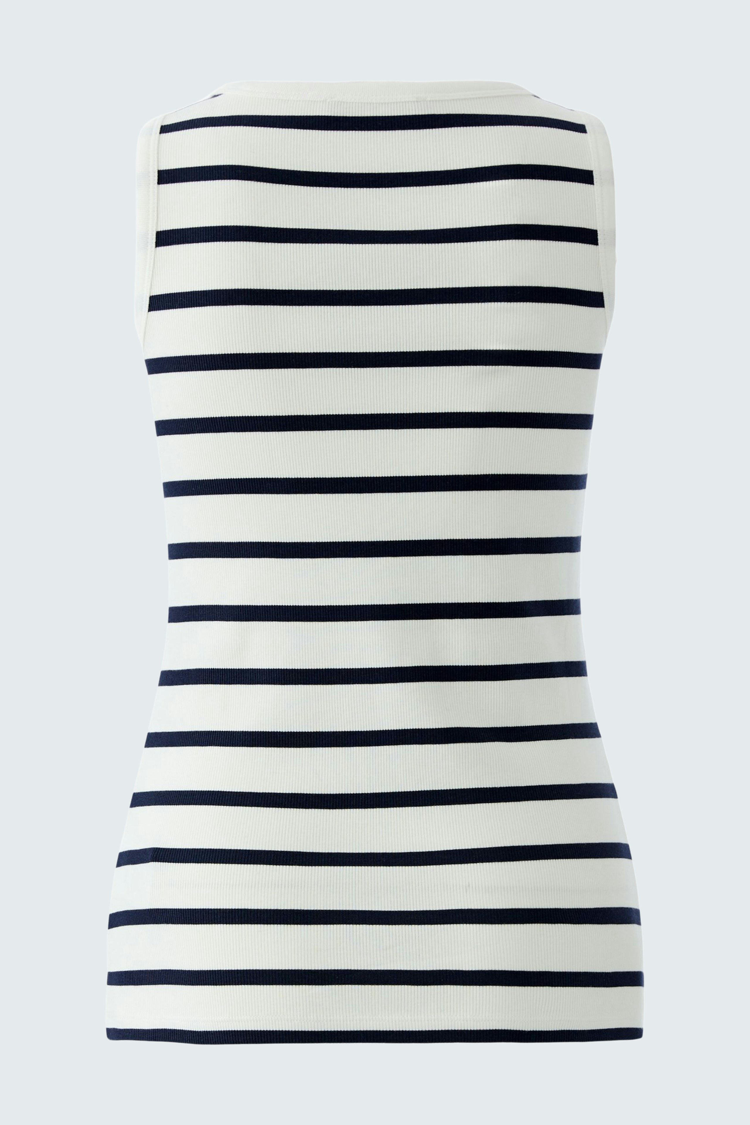 Casual women's tank top: A woman in a striped sleeveless top with navy and white lines.