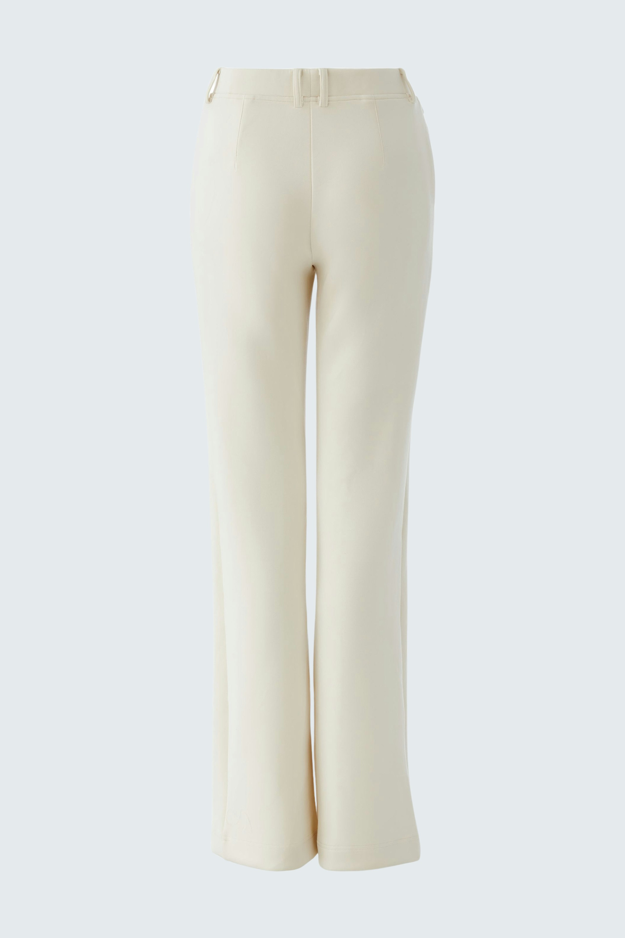 Casual women's pants in cream color with a flared design, perfect for everyday wear.