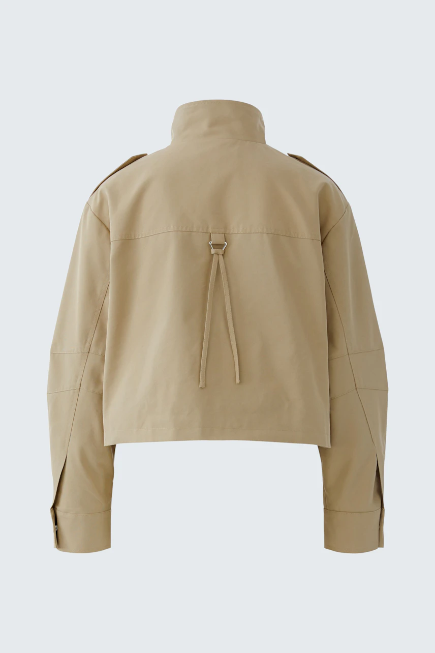 Casual women's blouson: A beige cropped jacket with a high collar and drawstring detail at the back.