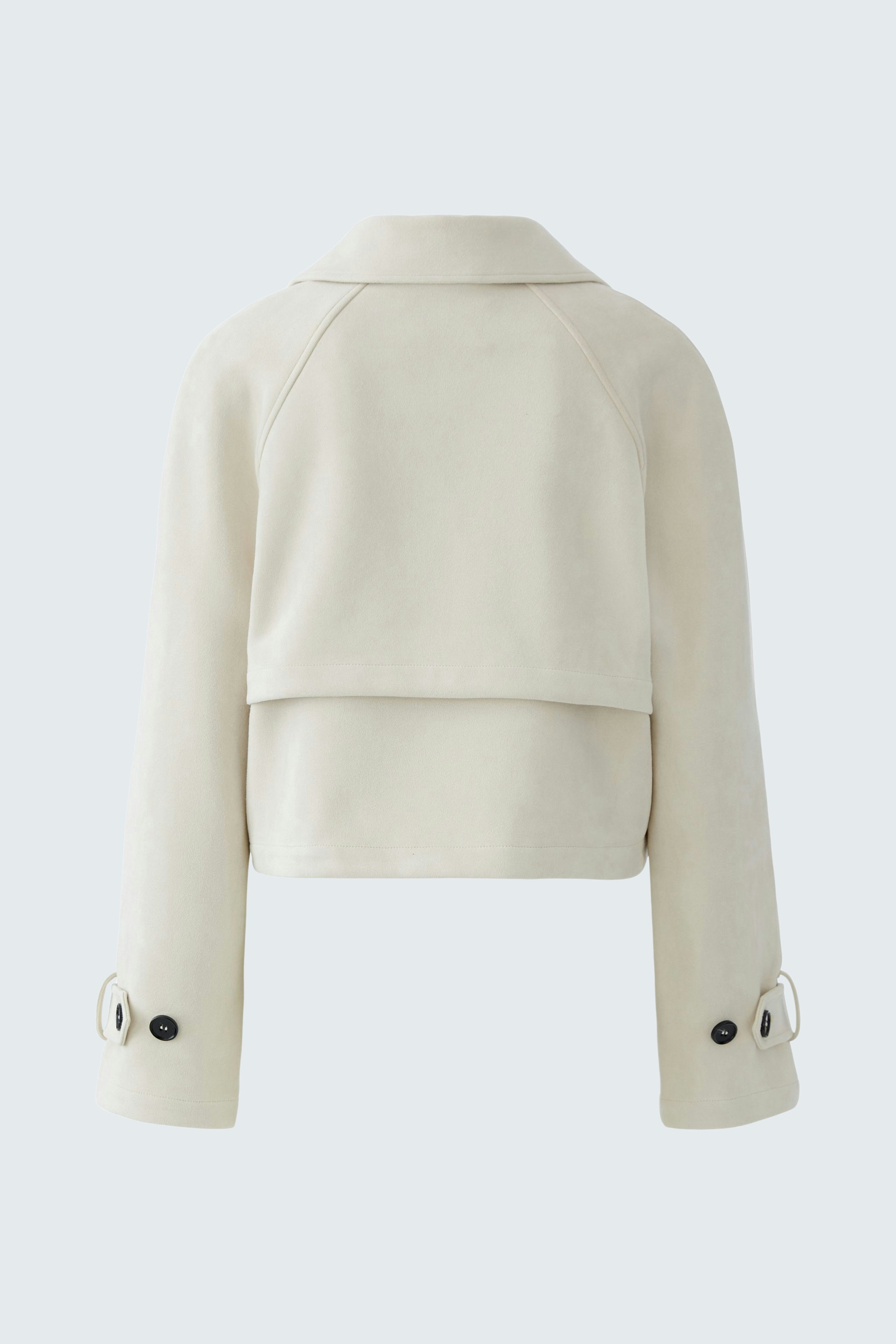 Stylish women's faux leather jacket in cream color with a cropped design and button details.