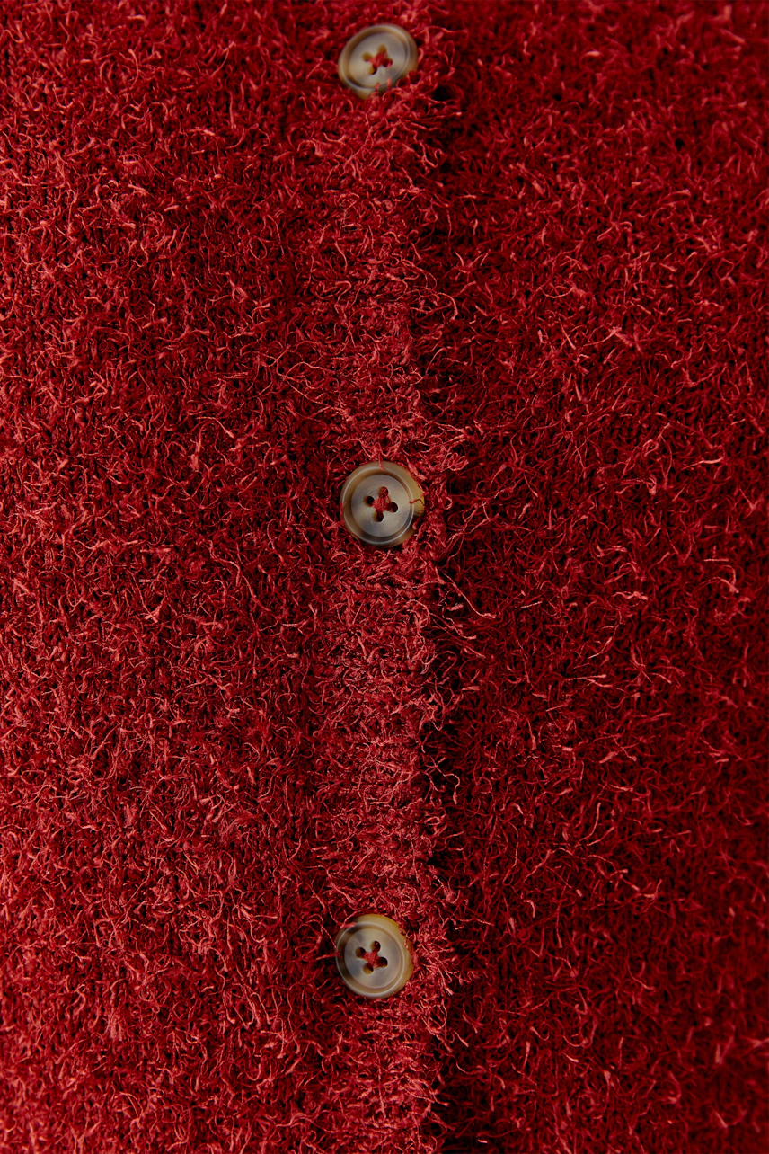 Cozy women's cardigan in rich red with button details, perfect for layering.