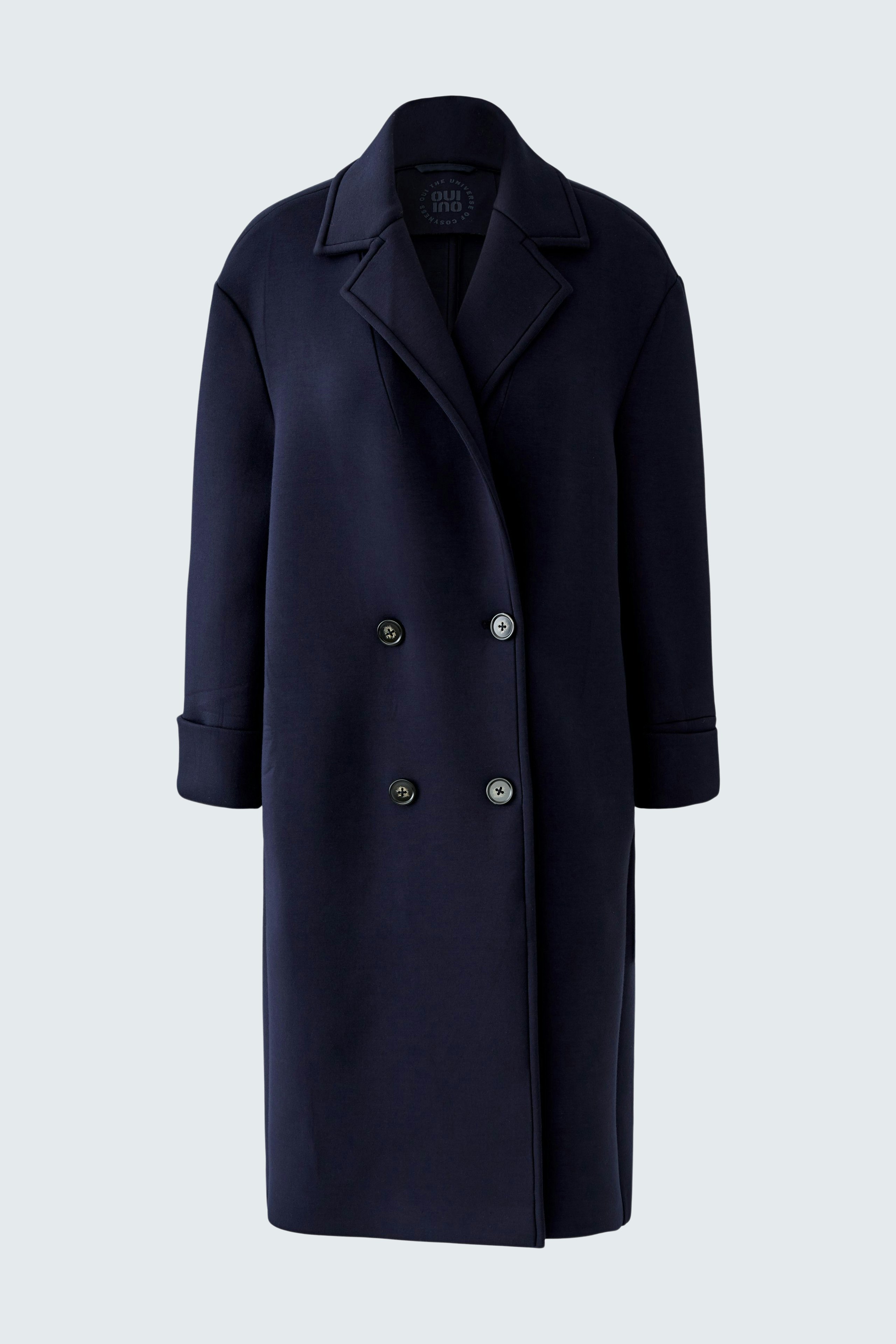 Stylish women's coat in dark navy with a double-breasted design and wide lapels.