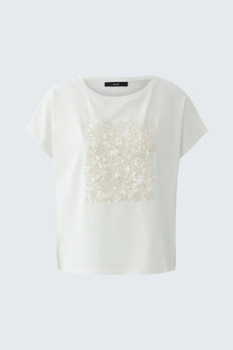 Bequemes Damen-T-Shirt: Weiße Kurzarmbluse mit glitzerndem Quadrat auf der Vorderseite.