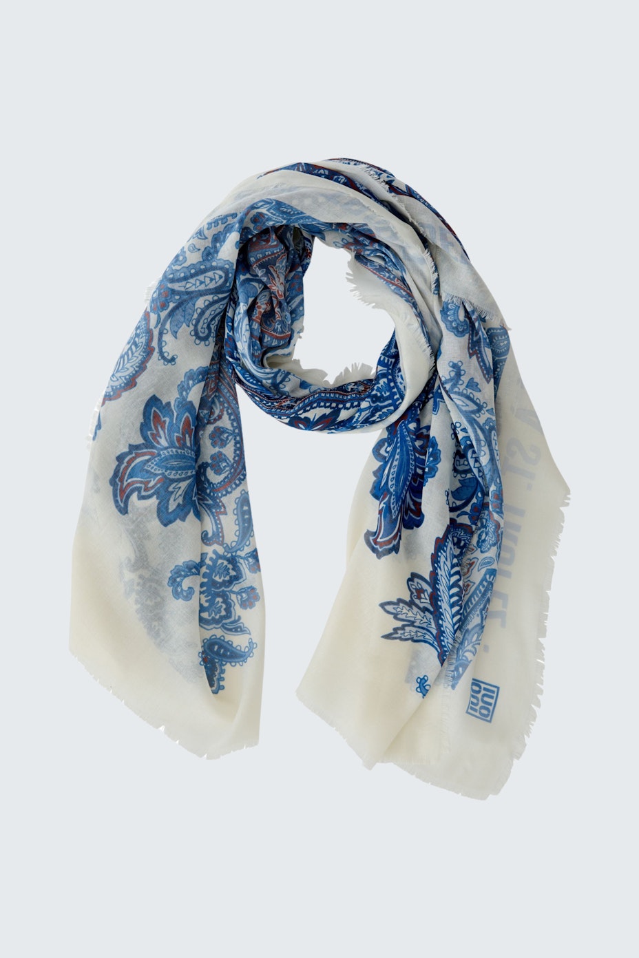 Lightweight scarf with blue floral patterns, perfect for adding a touch of style to any outfit.