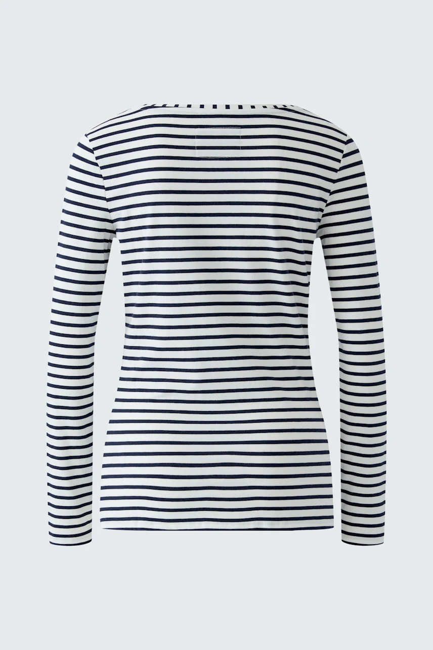 Striped long-sleeve shirt: Classic black and white stripes, perfect for casual wear.