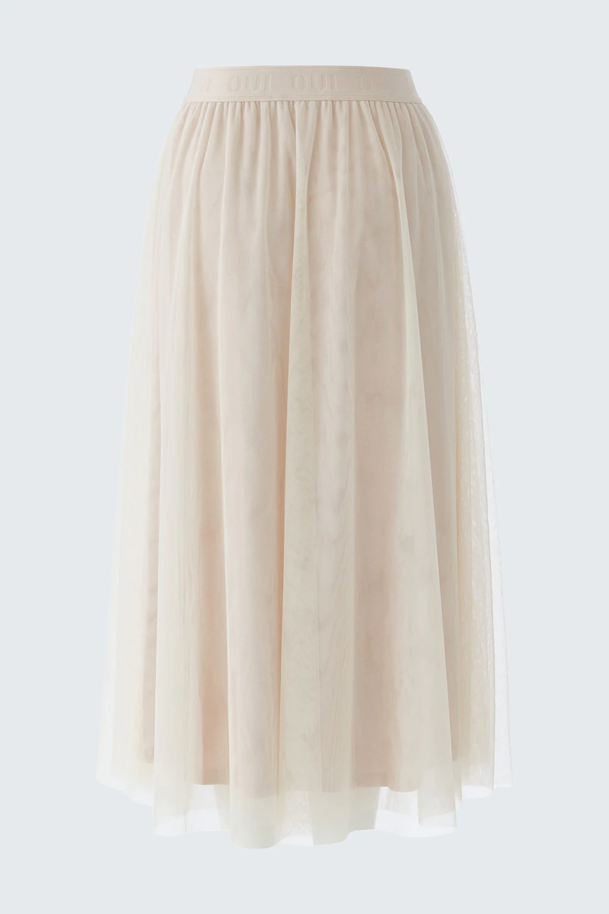 Casual A-line skirt in soft beige tulle, perfect for versatile styling.