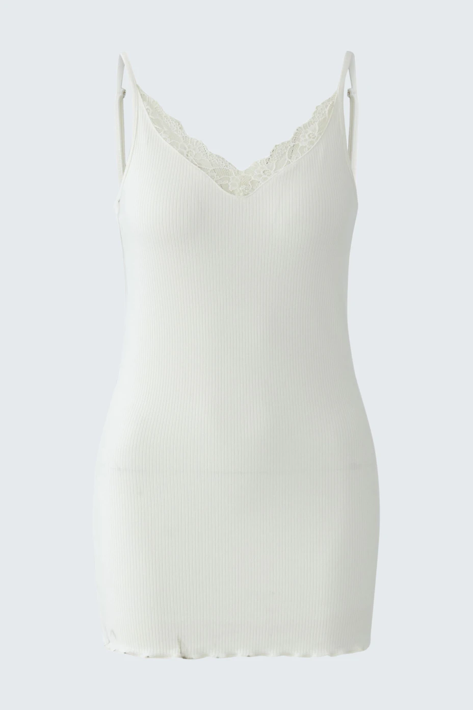White women's top with lace trim, sleeveless and fitted. Ideal for layering or wearing alone.