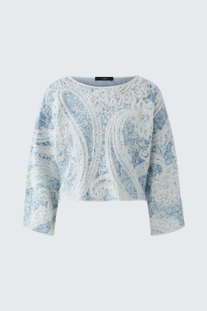 Damen-Pullover: Weicher, blauer Strickpullover mit weißem Paisley-Muster, ohne Model abgebildet.