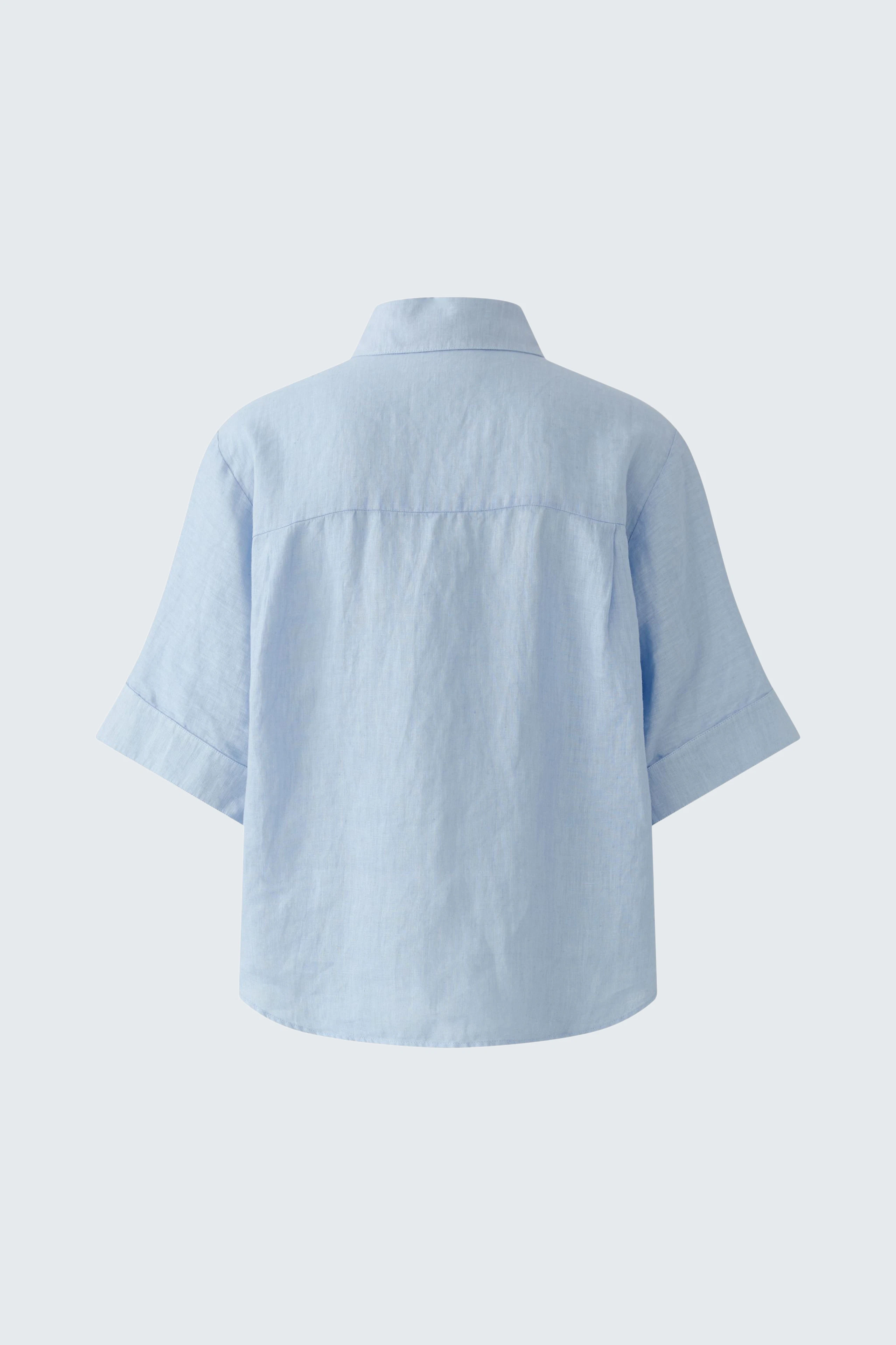 Lässige Damen-Bluse: Hellblaue Bluse mit kurzen Ärmeln und lockerer Passform, ideal für den Alltag.