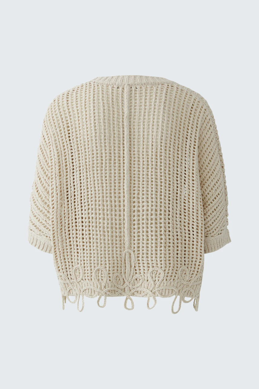 Lightweight women's cardigan with a relaxed fit and open knit design, perfect for layering.