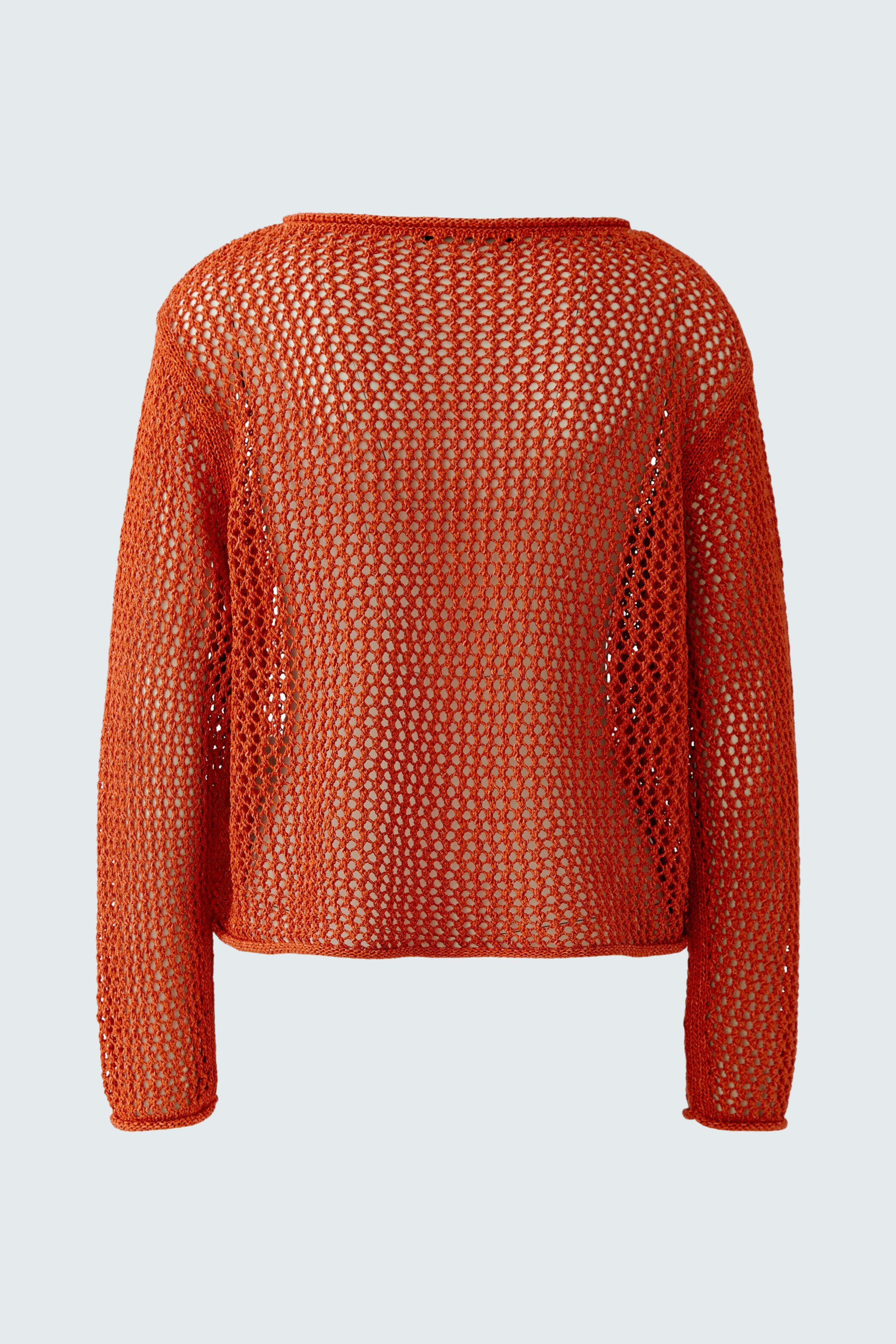 Vibrant orange pullover: Open-knit design, perfect for layering, adds a pop of color to any outfit.
