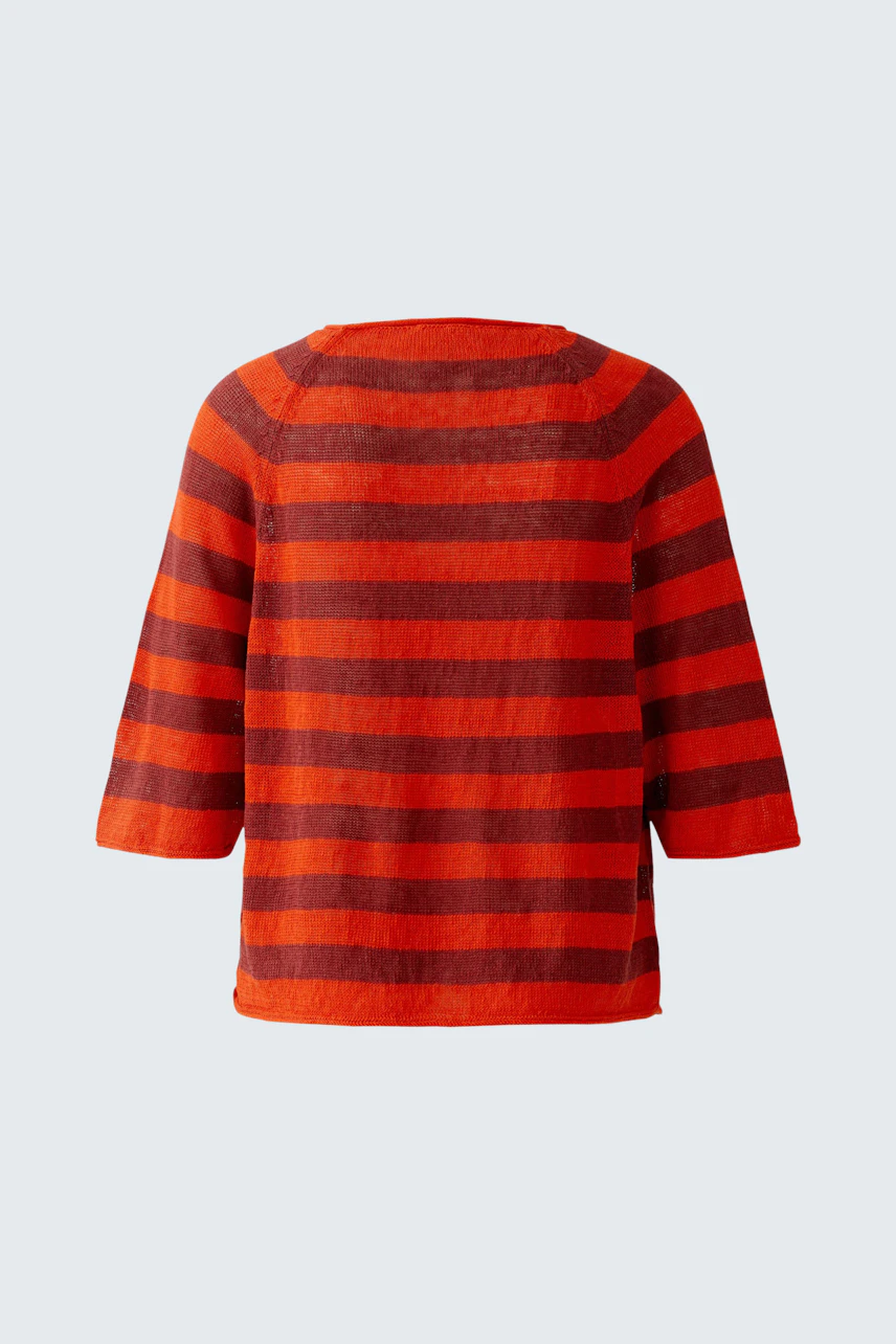 Casual women's pullover: Red and orange striped pullover with three-quarter sleeves.
