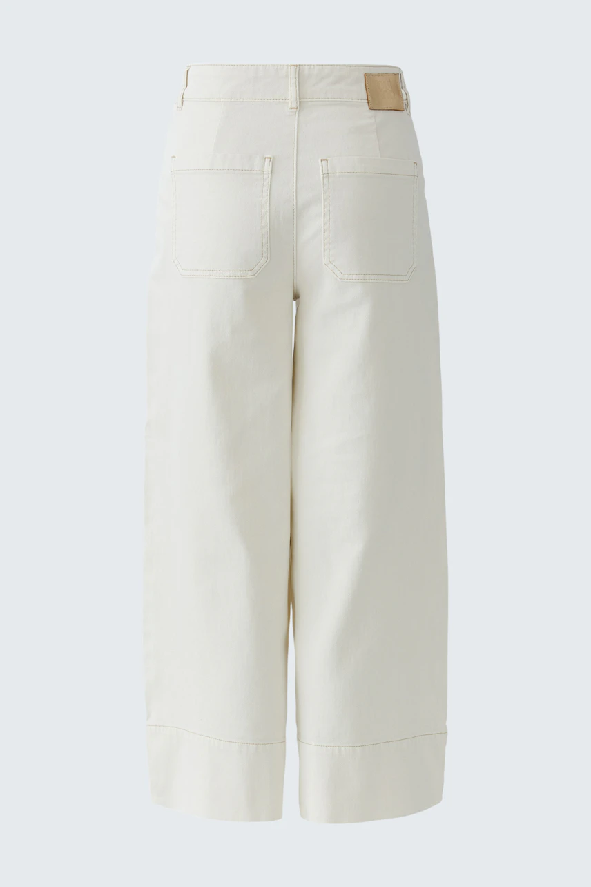 Wide leg jeans for women in a light color with a relaxed fit and practical pockets.