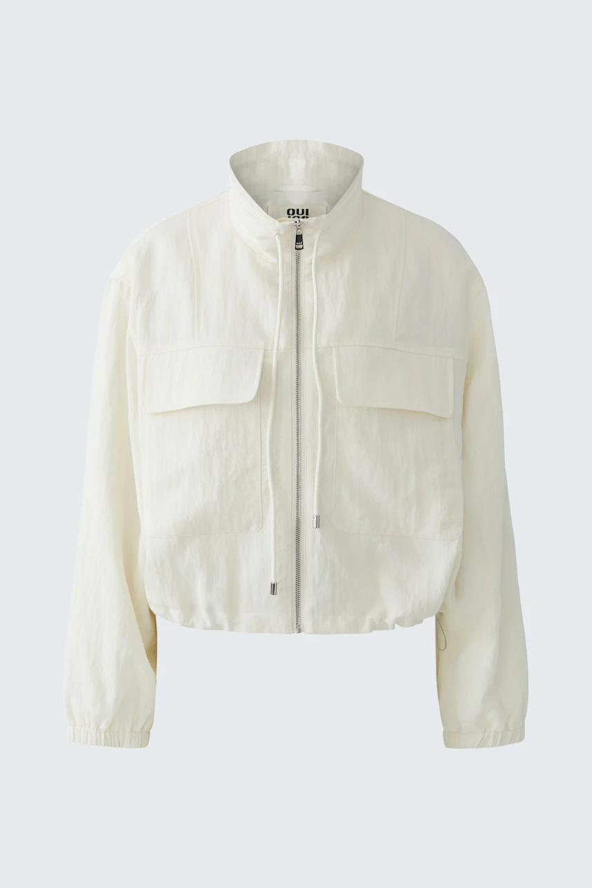 Casual women's blouson: A woman in a white zip-up jacket with two front pockets.