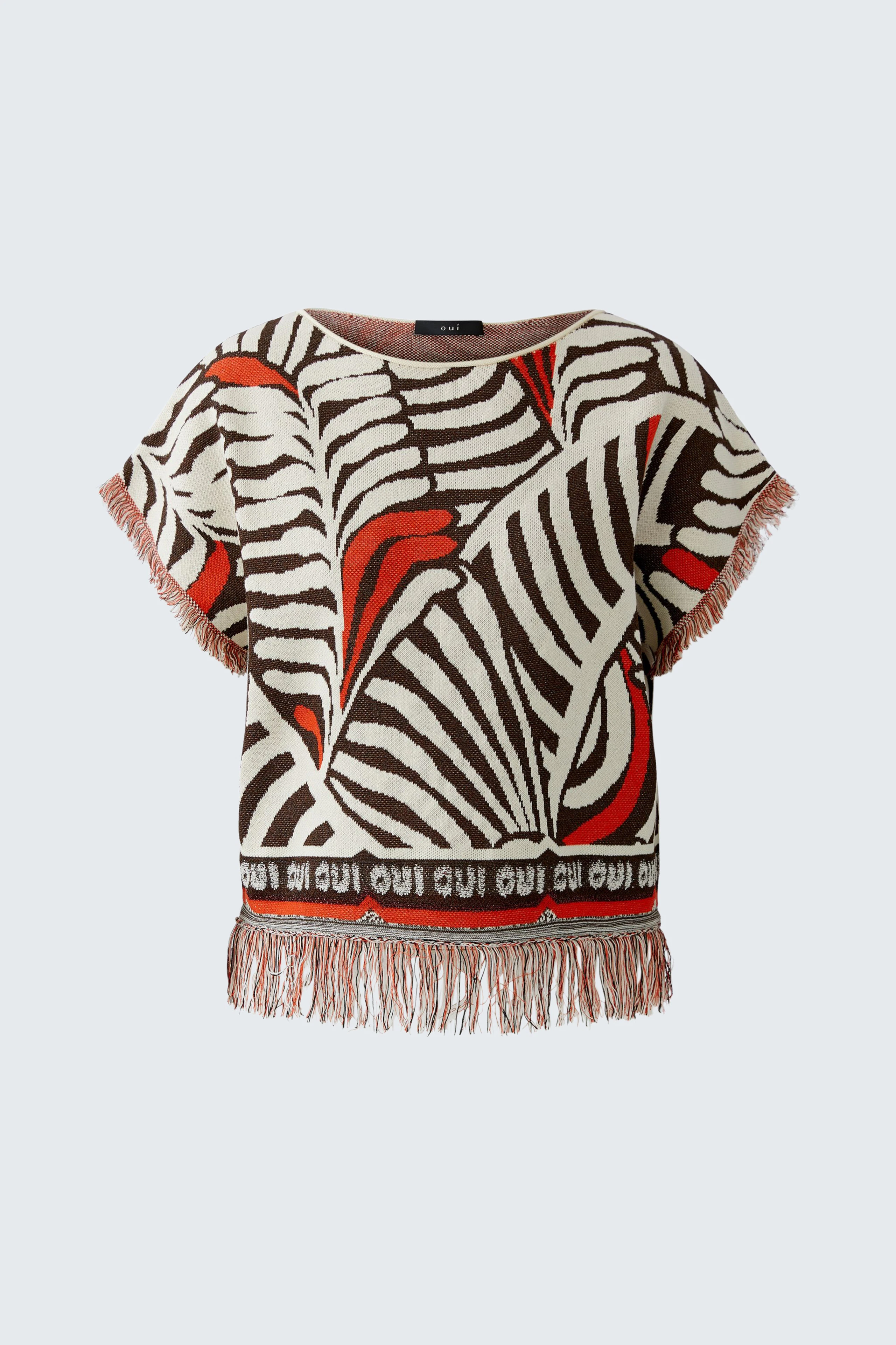Damen-Pullover mit auffälligem Zebra-Muster und Fransen, lässig und modern.