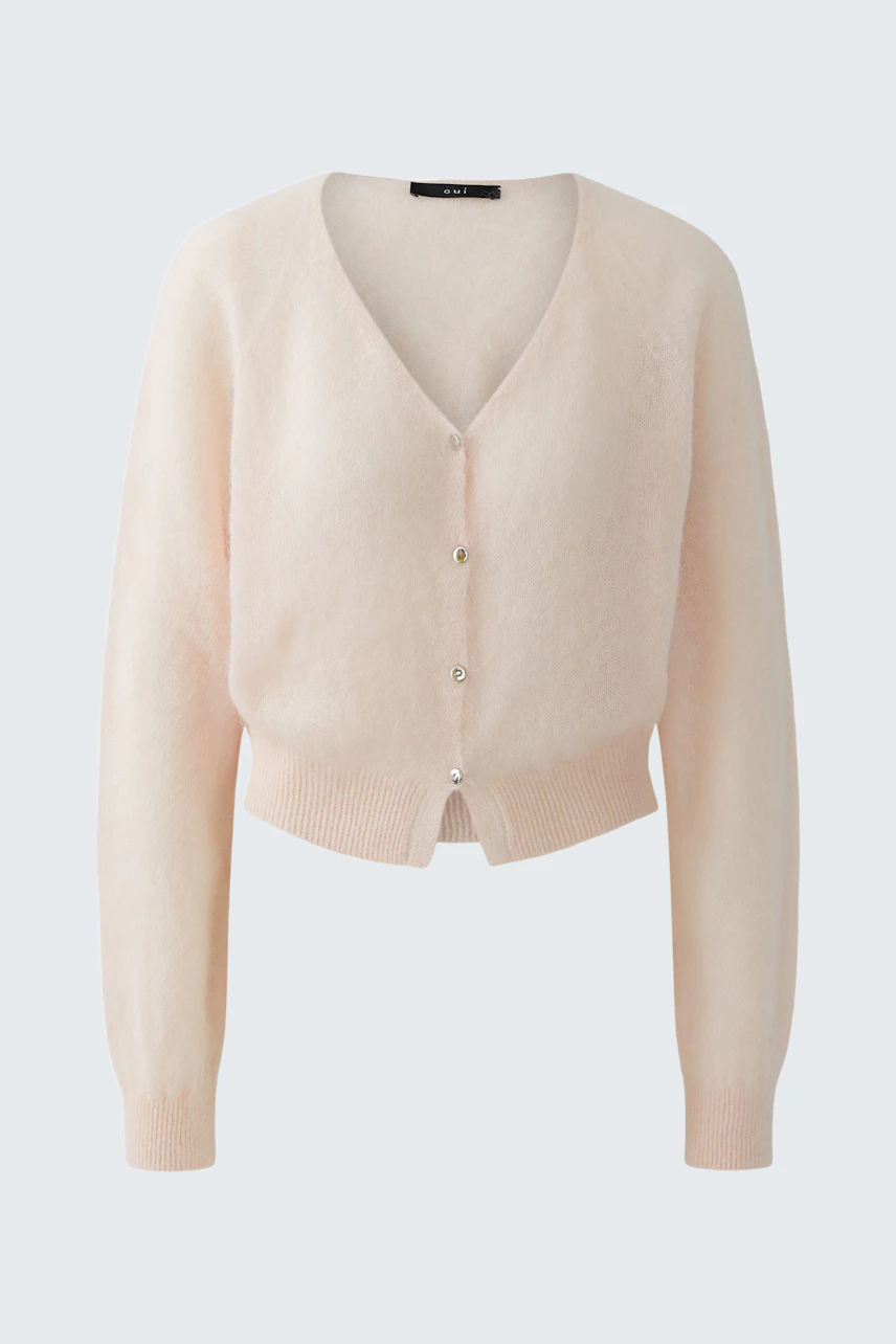 Soft women's cardigan in light pink with a V-neck and button closure, perfect for layering.