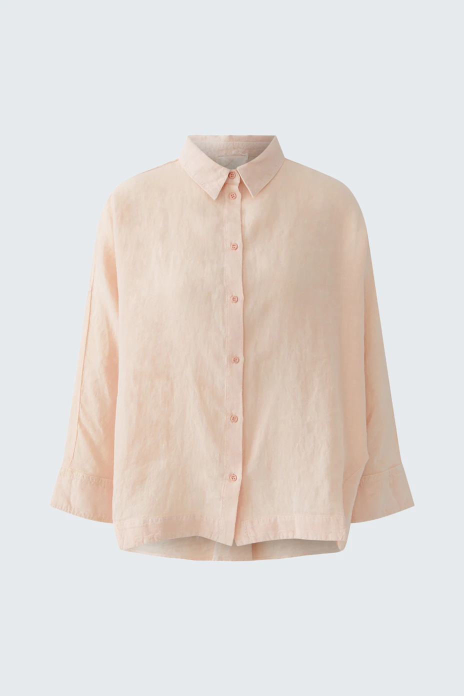 Bequeme Damen-Bluse in zartem Rosa mit Knopfleiste und lässigem Schnitt.