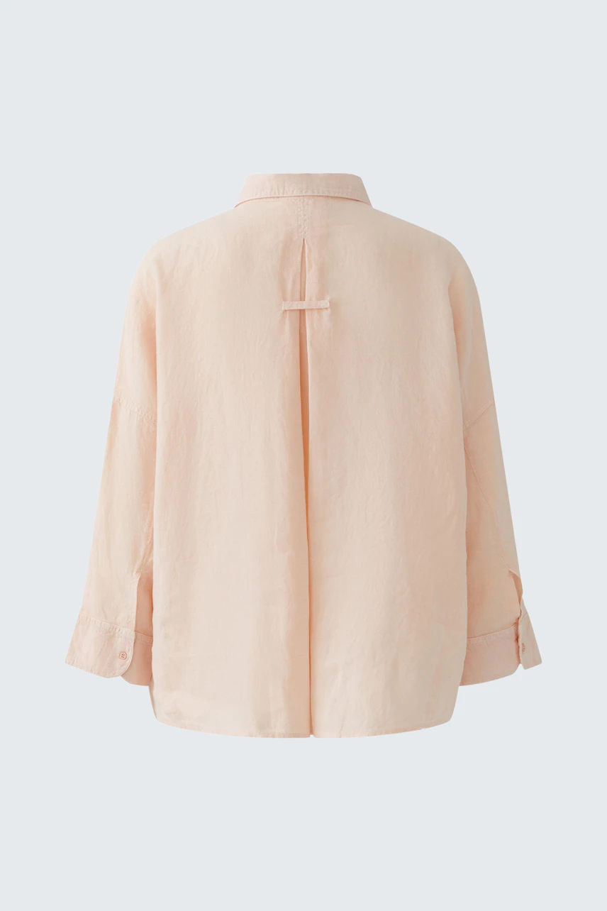 Lässige Damen-Bluse in sanftem Rosa, ohne Model. Ideal für einen entspannten Look.