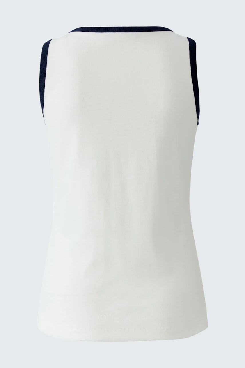 Casual tank top in white with navy trim, shown from the back. Simple and versatile for everyday wear.