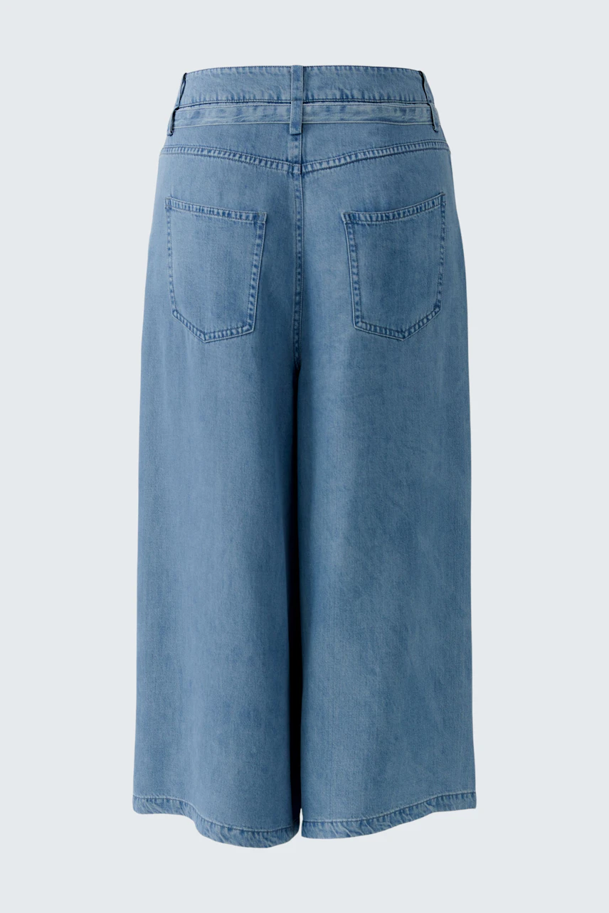 Casual women's pants: Light blue wide-leg denim pants with back pockets, no model visible.