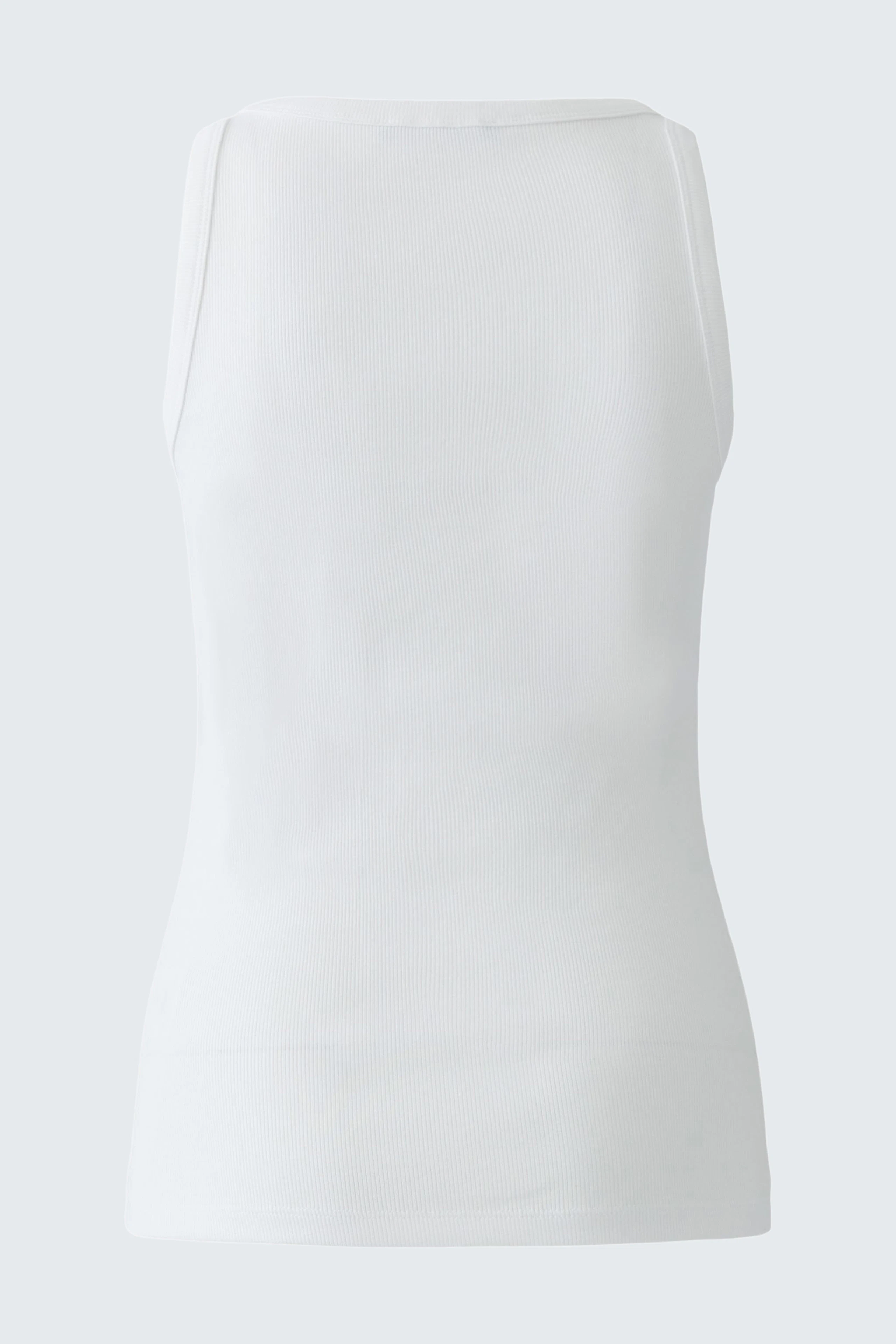 White tank top: Simple and versatile, perfect for layering or wearing alone.