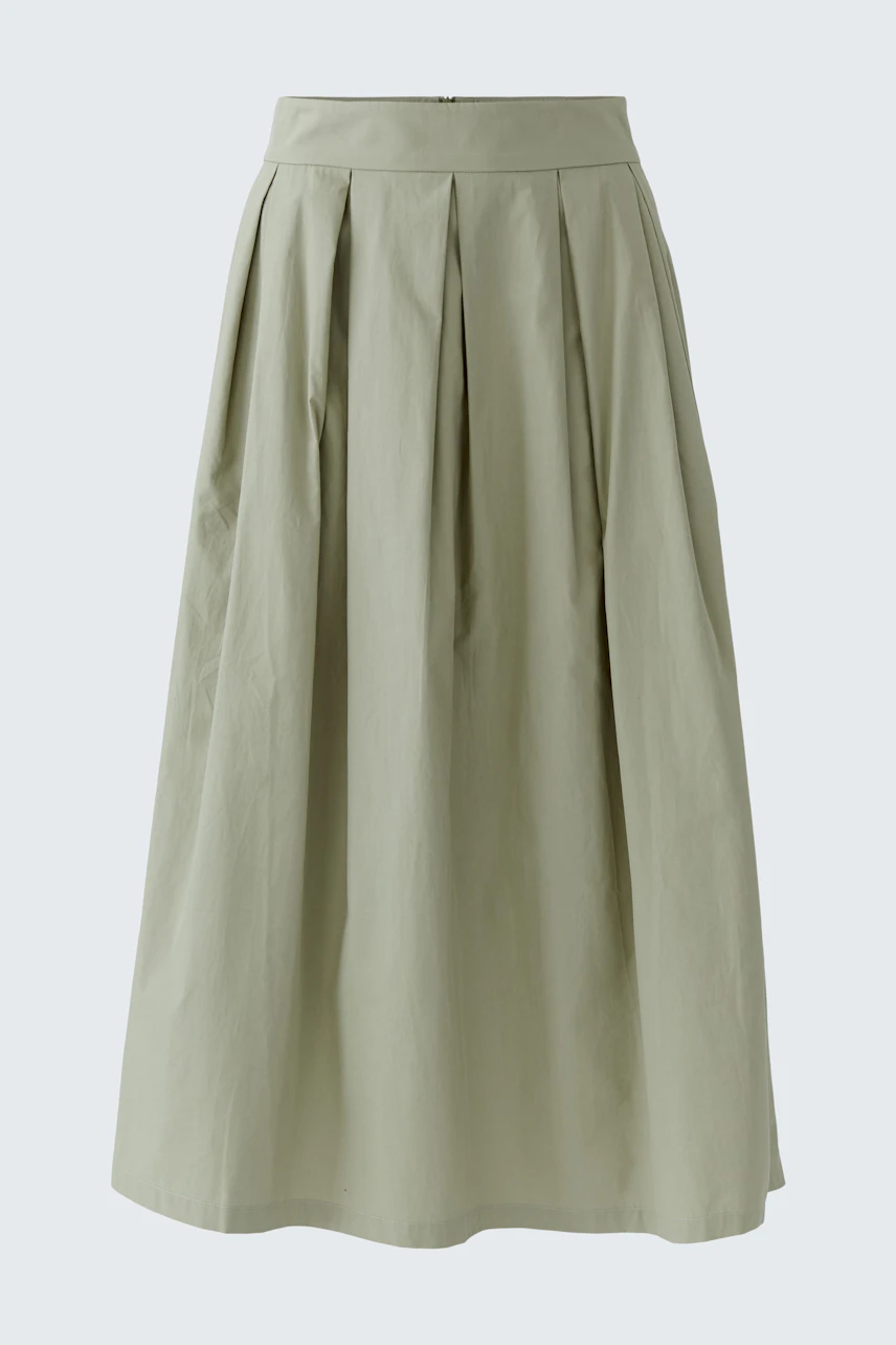 Casual A-line skirt in light green, featuring pleats and a high waist, perfect for everyday wear.