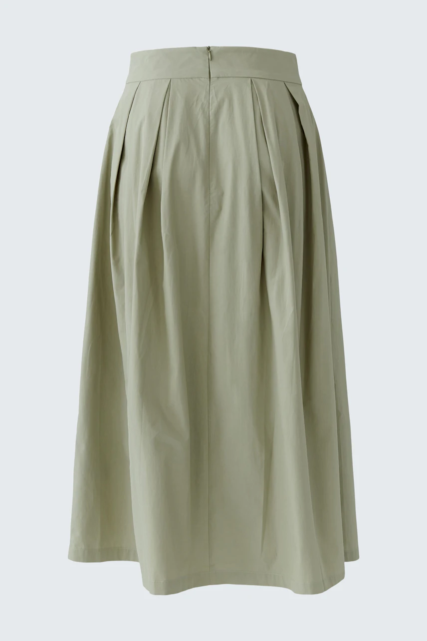 A-line skirt in light green, featuring a high waist and pleated design. Perfect for casual outings.