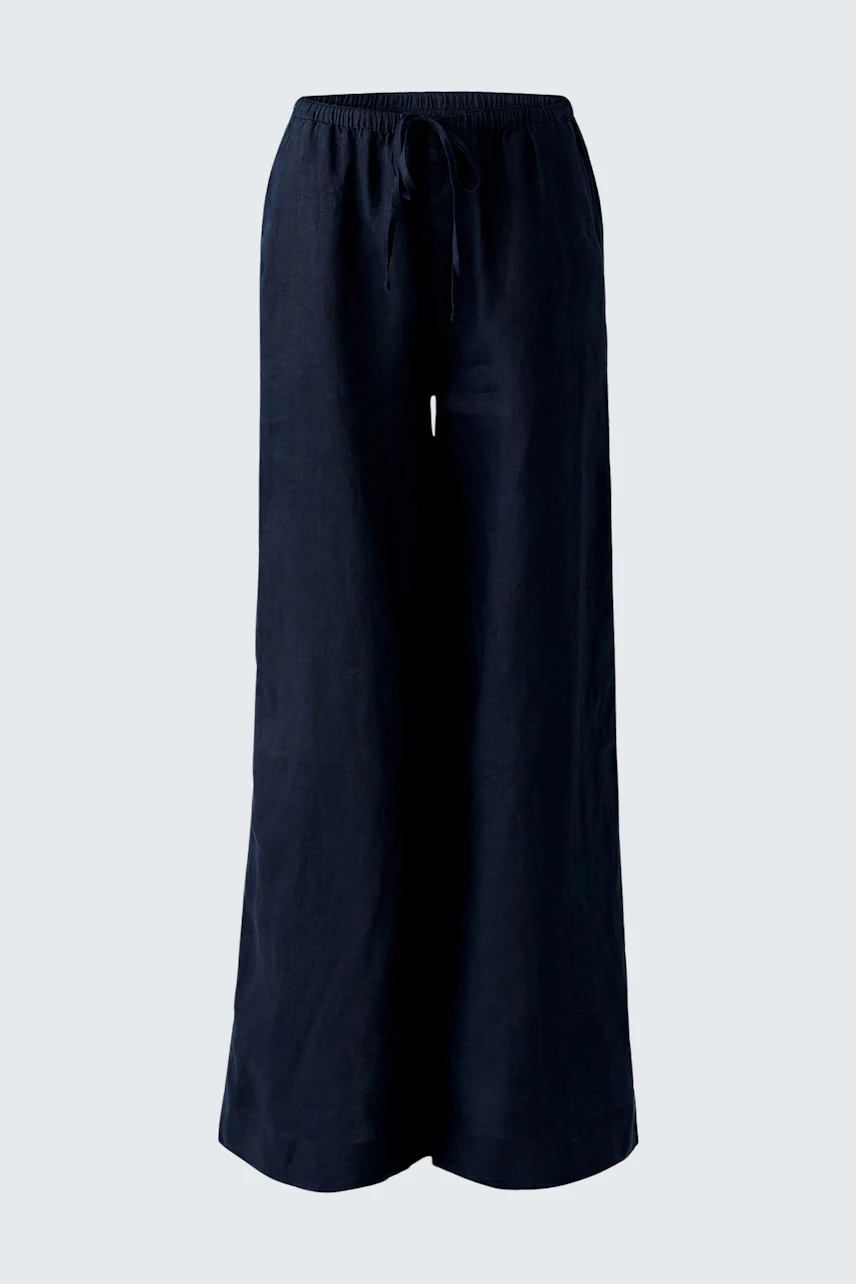 Casual Marlene pants: Wide-leg navy trousers with drawstring waist, perfect for relaxed style.