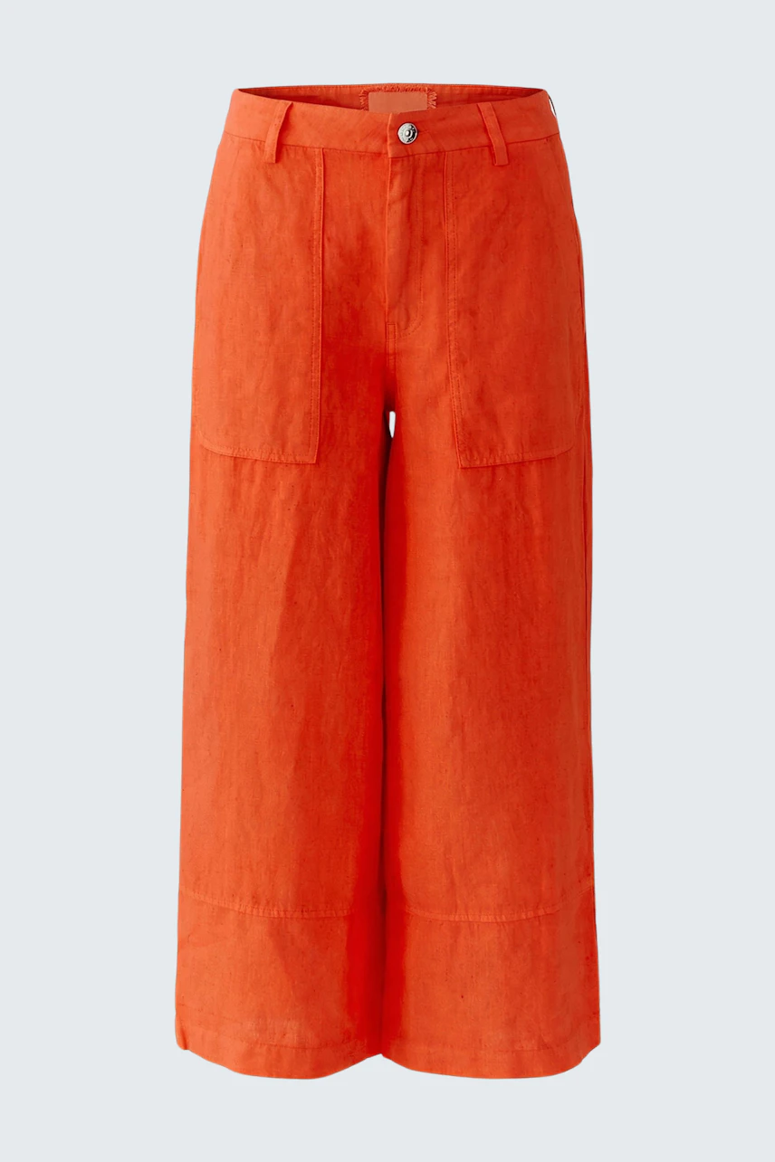 Bright orange pants: Wide-leg, high-waisted design with front pockets, perfect for a bold casual look.