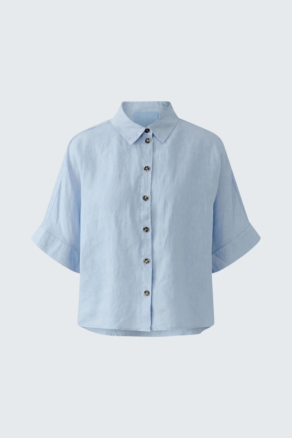 Lässige Damen-Bluse: Hellblaue Bluse mit Knopfleiste und kurzen Ärmeln, ideal für einen entspannten Look.