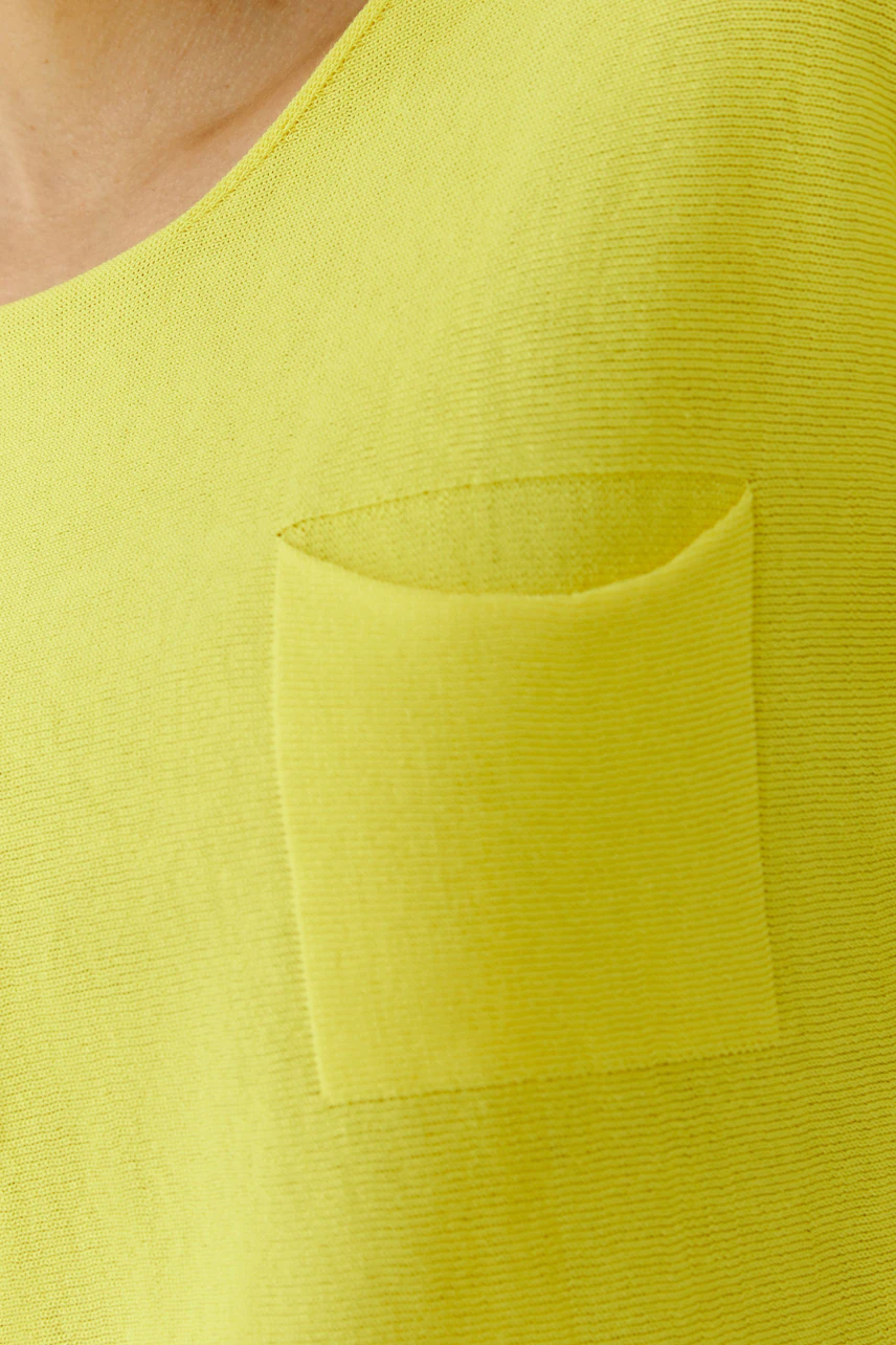 Bright yellow pullover with a front pocket detail, perfect for a casual and vibrant look.