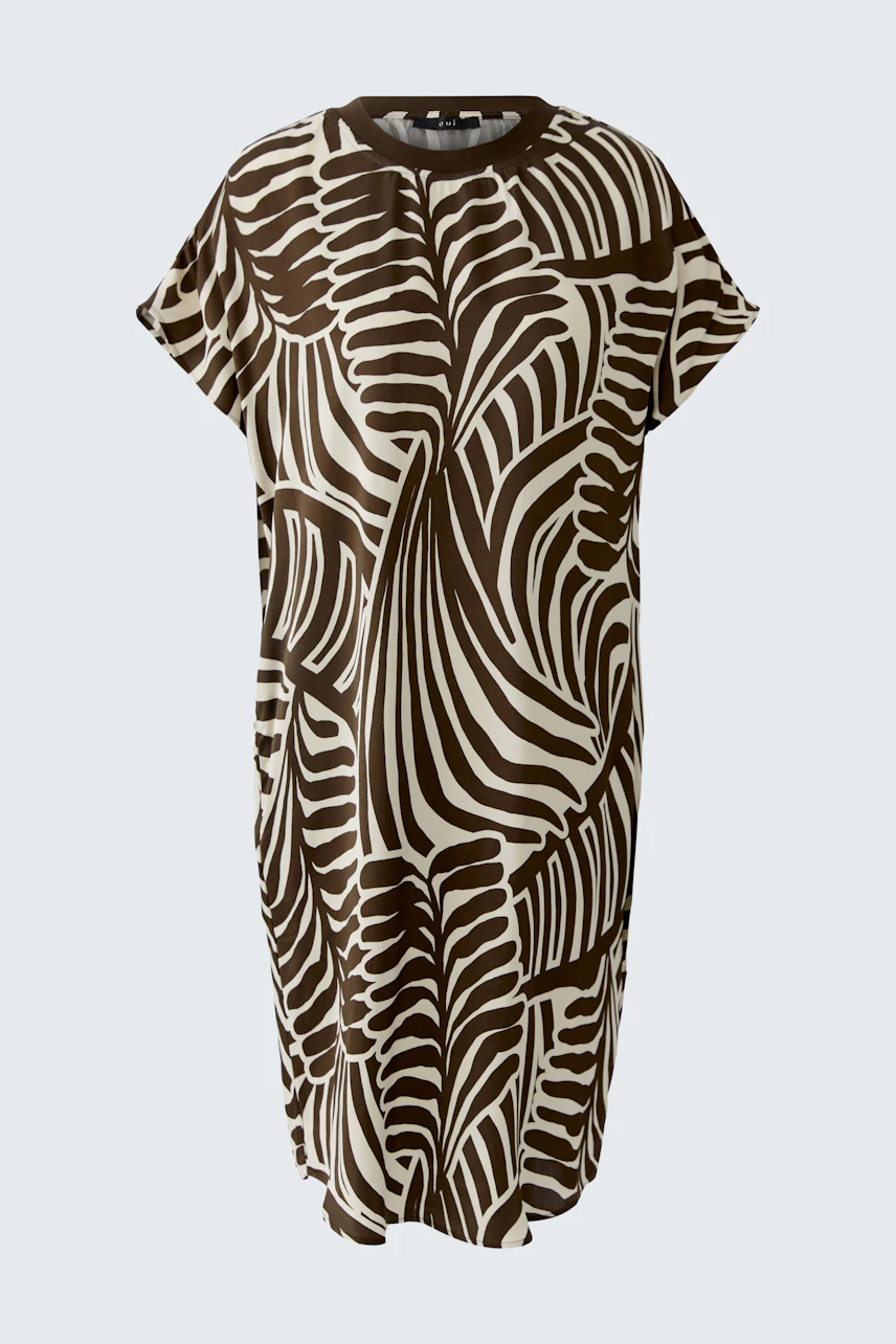 Casual hanger dress with bold zebra print in brown and white. Loose fit, short sleeves, no model shown.