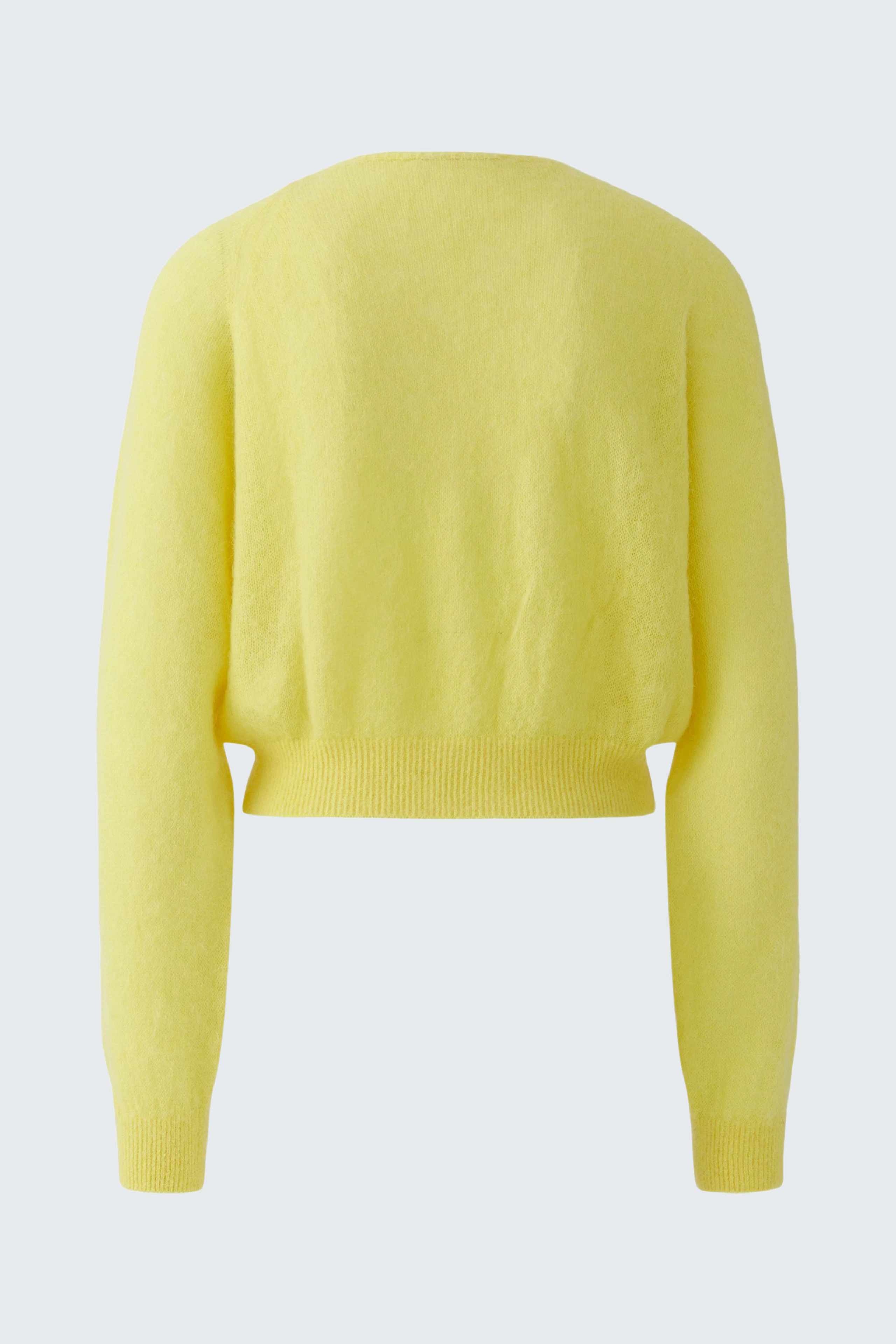 Bright yellow cardigan: Soft knit cardigan with a relaxed fit, perfect for layering.