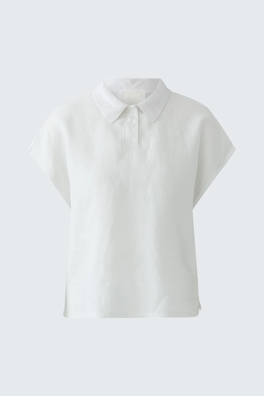 White blouse: Simple, sleeveless design with a classic collar, perfect for casual or office wear.