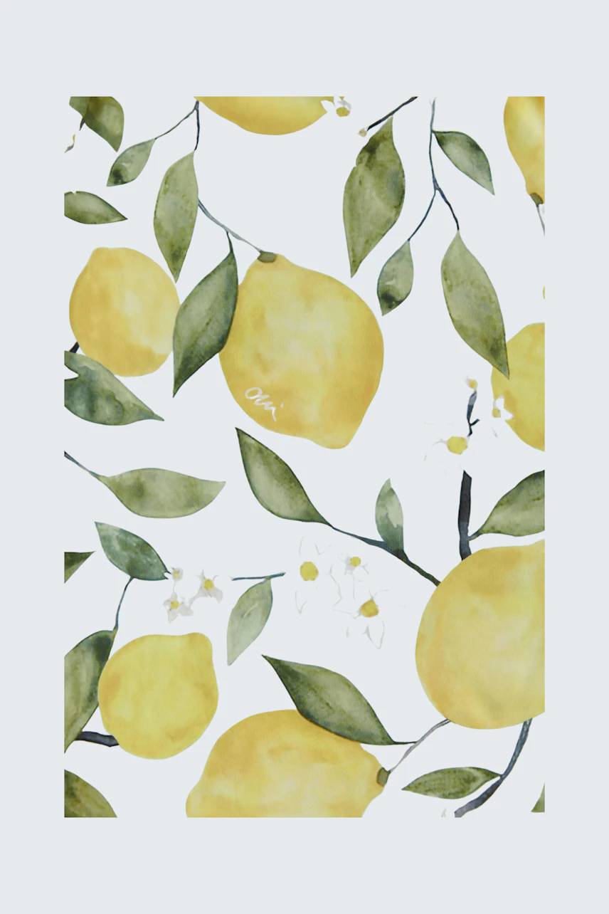 Colorful scarf with lemon print, featuring vibrant yellow lemons and green leaves on a dark background.