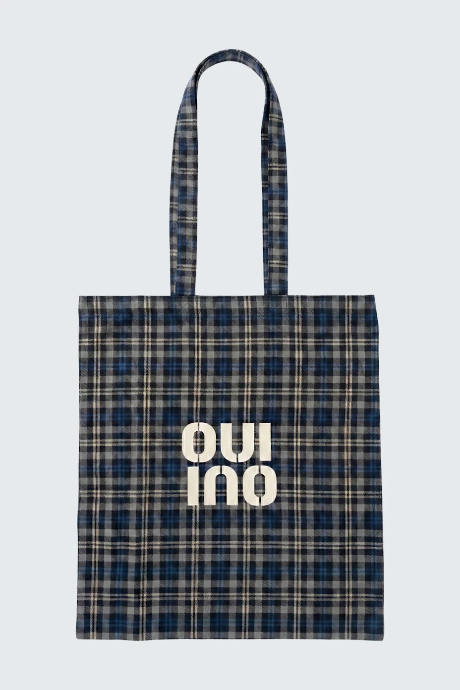 Plaid tote bag with "Oui" logo in white. Perfect for casual outings and daily use.