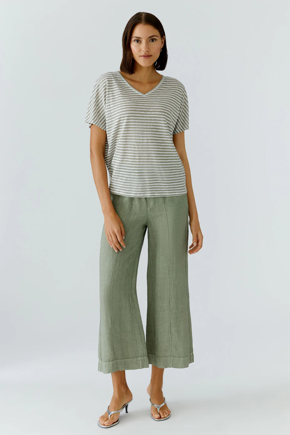 Casual women's pants: Relaxed fit, wide-leg green pants with elastic waistband, no model shown.