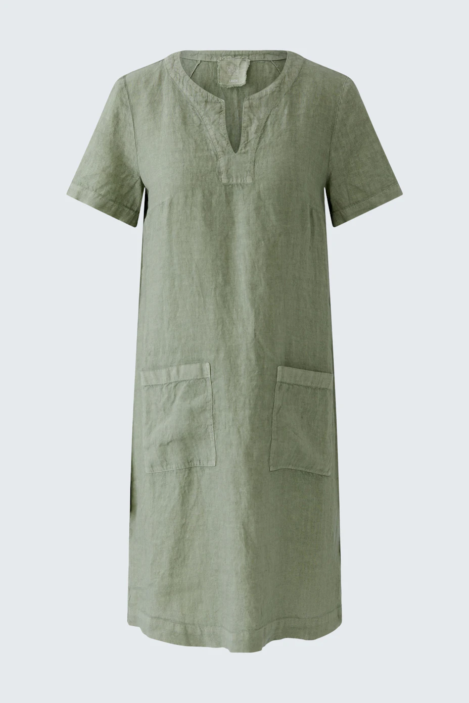 Grünes A-Linien-Kleid aus Leinen mit kurzen Ärmeln und aufgesetzten Taschen, ohne Model.