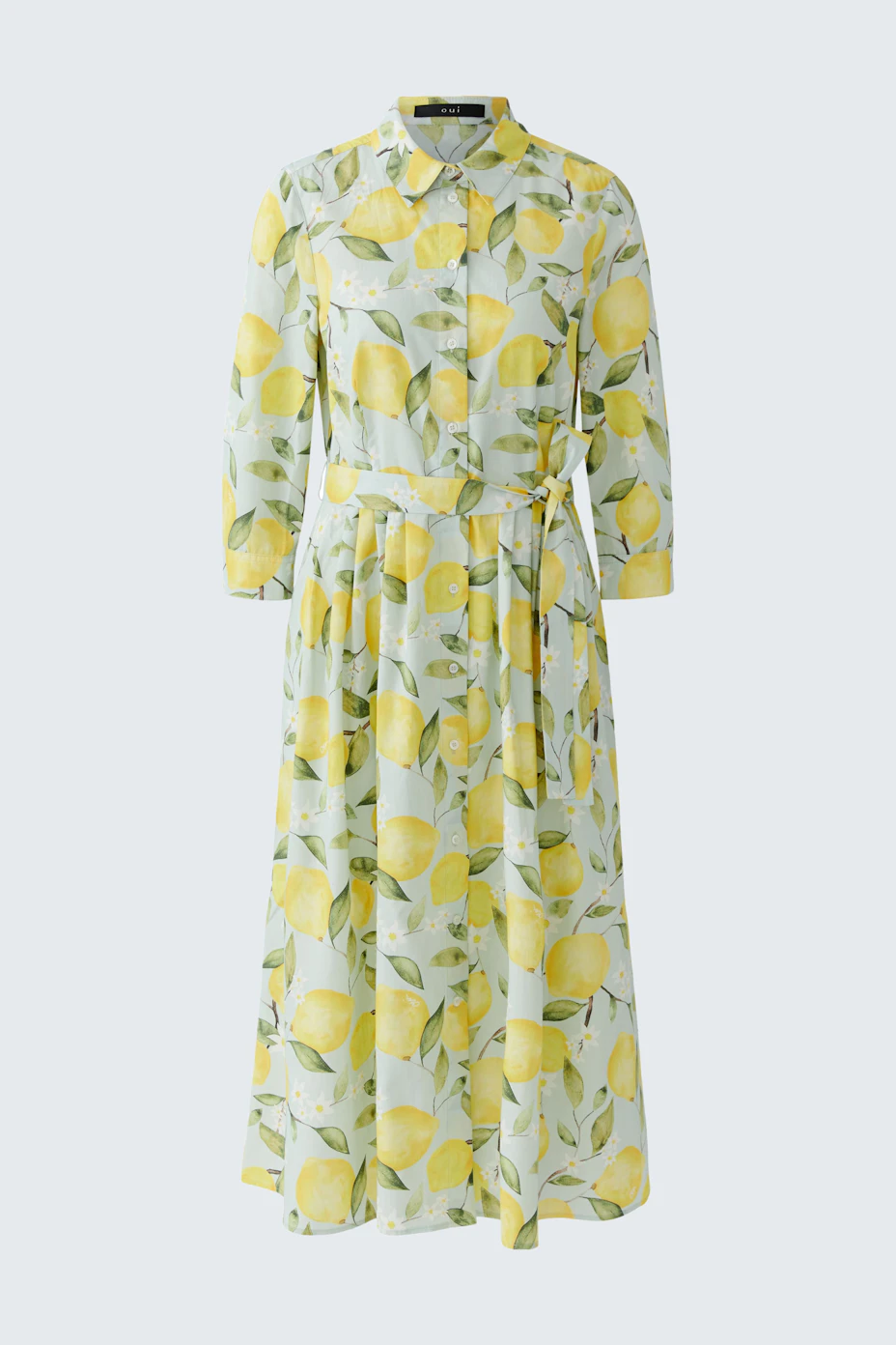 Vibrant midi dress with lemon print, featuring long sleeves and a button-up front. Perfect for sunny days.