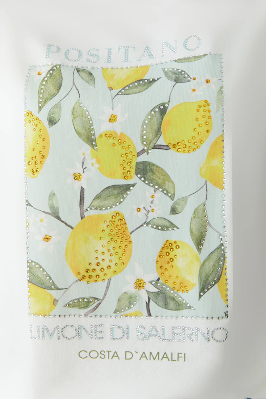 Damen-T-Shirt mit Zitronenprint: Frisches Design mit gelben Zitronen und grünen Blättern auf weißem Hintergrund.