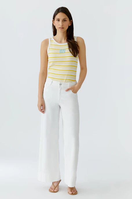 Striped tank top: Yellow and white stripes with "Oui" logo, sleeveless design, perfect for casual wear.