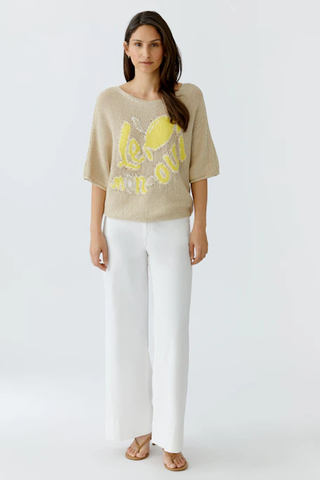 Casual pullover: Beige pullover with yellow lemon graphic and "le mon oui" text, no model shown.