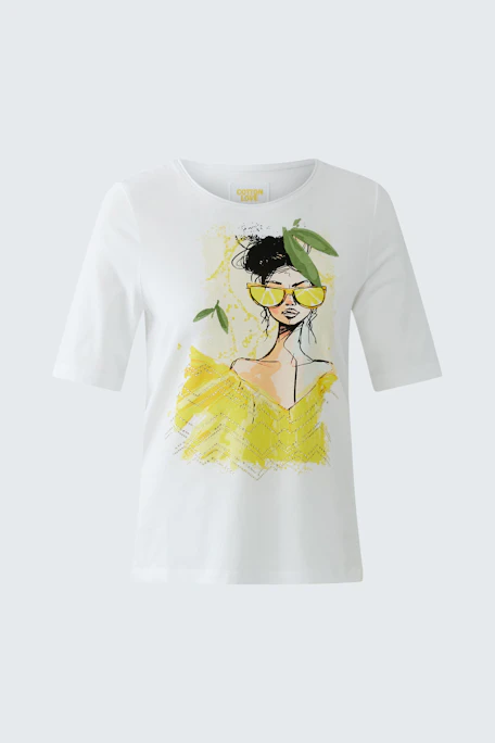 White T-shirt with artistic print of a woman in yellow, featuring short sleeves and a round neckline.