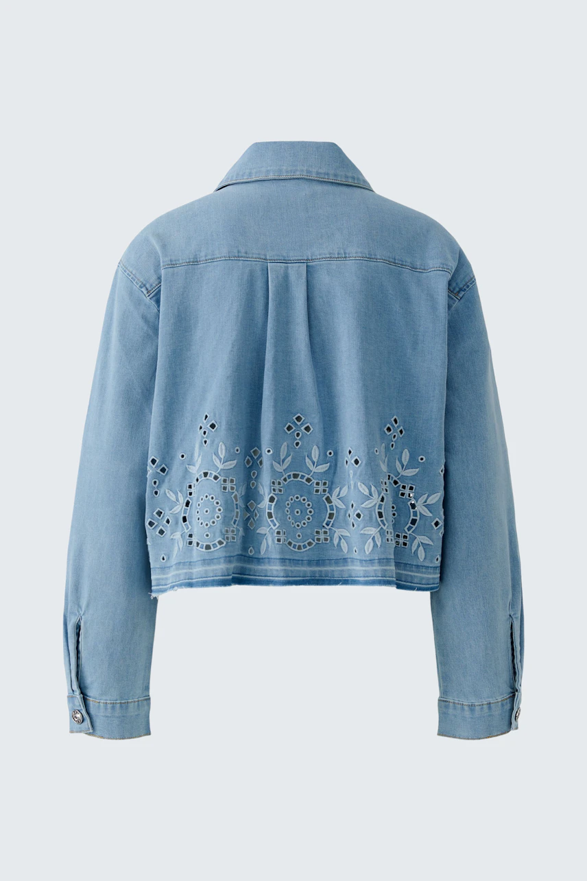 Denim jacket with intricate back embroidery, showcasing casual style. No model, just the jacket.