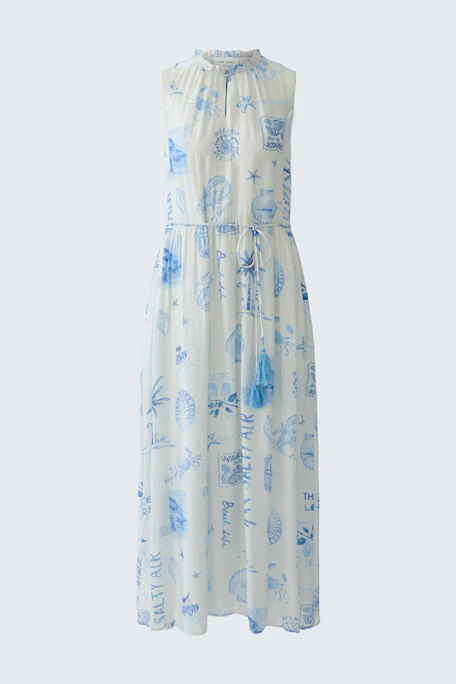 Flowy maxi dress with blue prints, sleeveless, featuring a tie waist. Perfect for casual summer days.