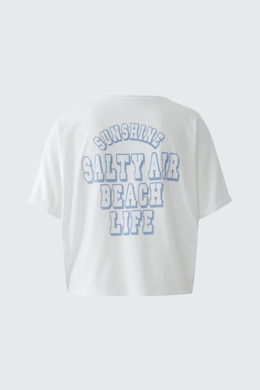 Casual women's T-shirt: White T-shirt with blue text 'Sunshine, Salty Air, Beach Life' on the back.