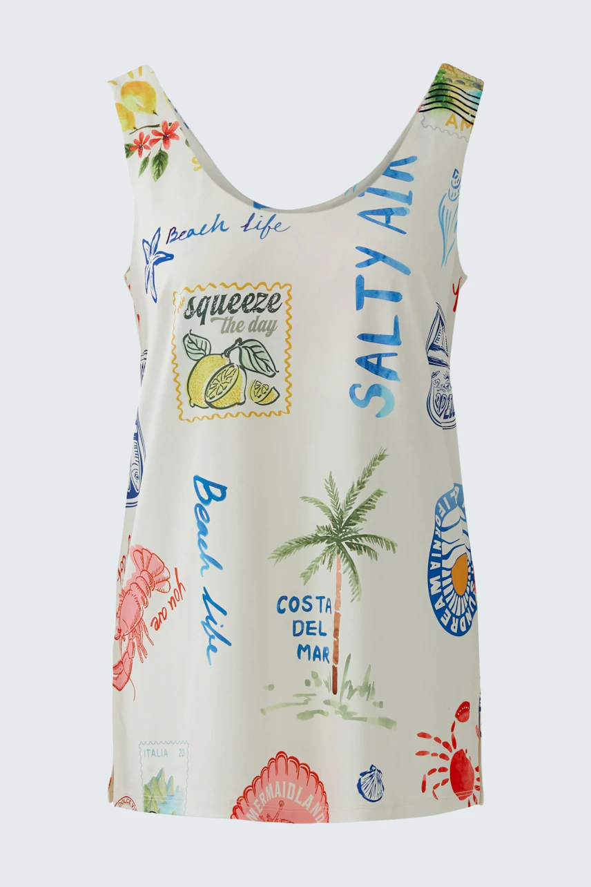 Colorful women's top with beach-themed prints, perfect for casual summer days.