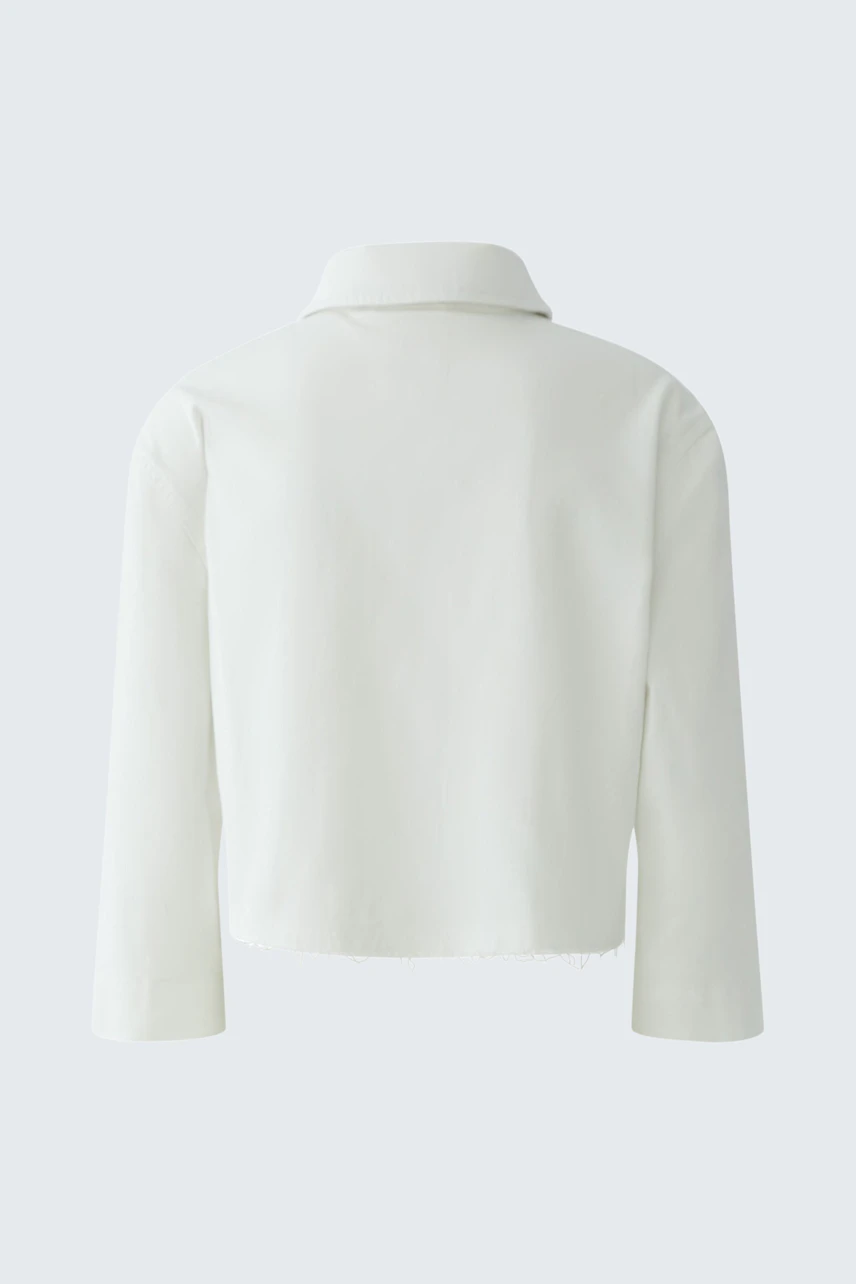 White denim jacket: Simple, cropped design with long sleeves and a classic collar, no model visible.